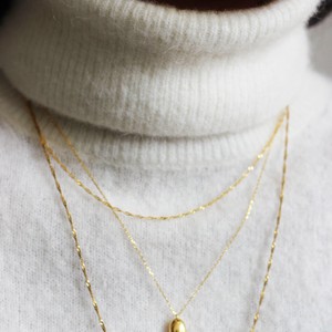 THE RAVEN NECKLACE - Solid 14k gold from Bound Studios