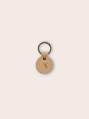 Ronde sleutelhanger BIRD - Beige from MADE out of