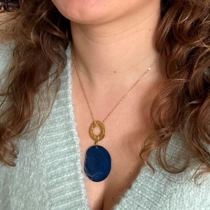 Celeste ketting met hanger van tagua en een goudkleurige ring - grijs from MoreThanHip