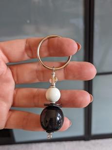 Cute keychain made of African beads "Bijoux Black and White" via PEARLS OF AFRICA