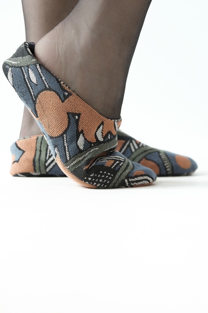 Moroccan-style carpet slippers in petrol, orange, navy and black from Pepavana