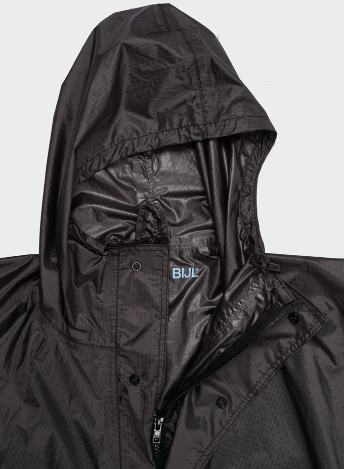 Susan Bijl | The New Raincoat Black from The Blind Spot